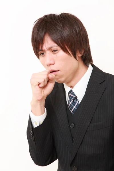 Coughing businessman — Stock Photo, Image