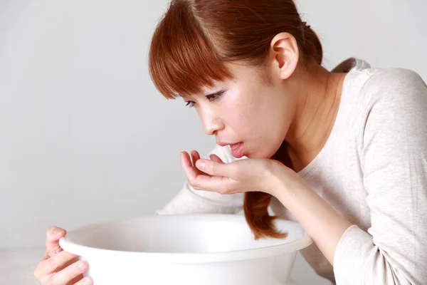 Vomiting woman — Stock Photo, Image