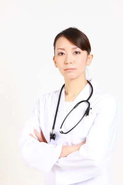 Młody japoński kobiece lekarz chętnie wypowiedzi — Zdjęcie stockowe