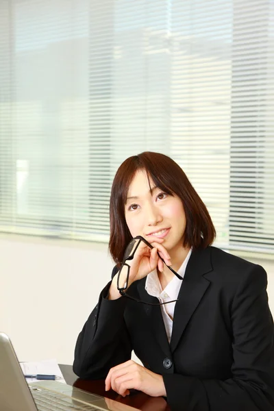 Japanese businesswoman dreaming at her future　 — Photo