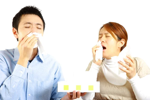 Japanese Couple suffers from allergic rhinitis — Stock Photo, Image