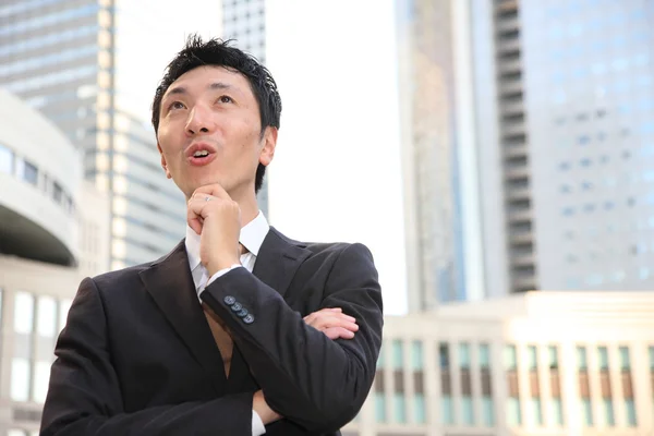 Japanischer Geschäftsmann träumt von seiner Zukunft — Stockfoto