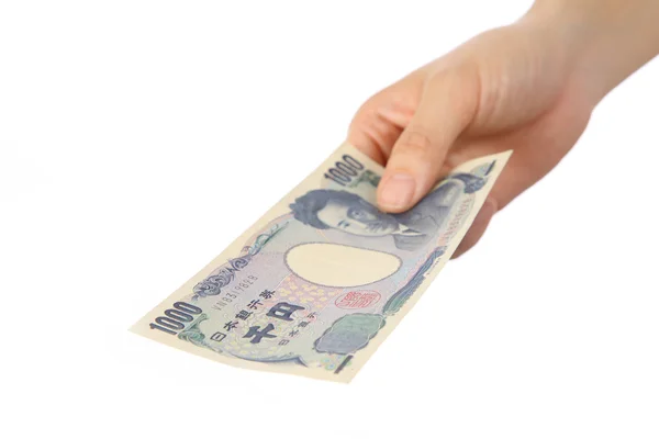 Pagar una factura japonesa de 1000YEN —  Fotos de Stock