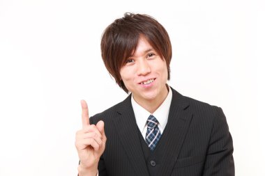 Sunulması ve bir şey gösterilen Japon işadamı