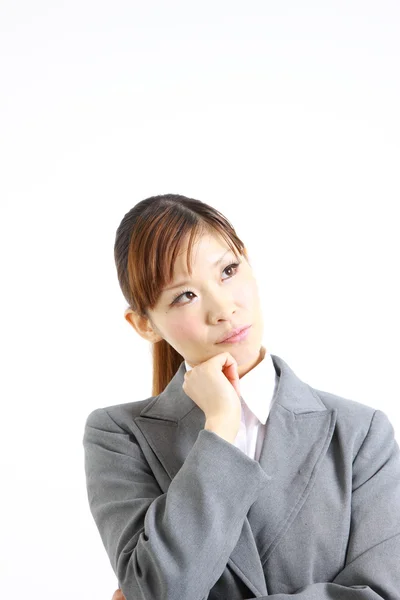 Japoński kobieta myśli o czymś — Zdjęcie stockowe