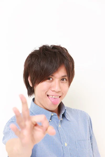 Jonge Japanse man perfect teken weergegeven: — Stockfoto