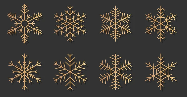 Copos de nieve dorados gradiente invierno nieve set vector — Archivo Imágenes Vectoriales