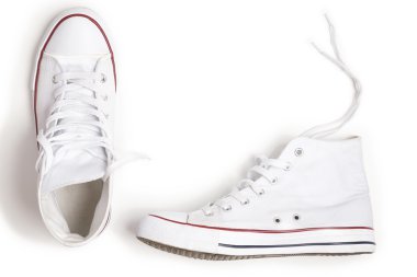 Beyaz arka plan üzerinde izole yeni beyaz ayakkabı.