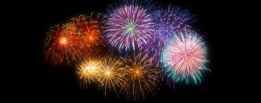 Bokeh özgeçmişi olan renkli bir havai fişek. Yeni yıl kutlaması, soyut tatil geçmişi