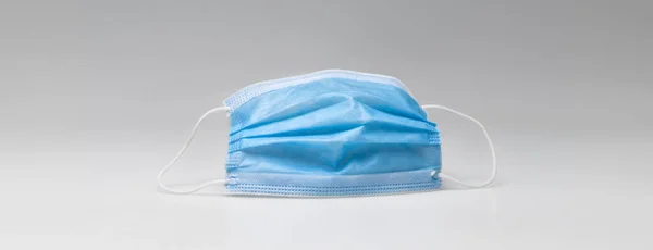 Typical surgical mask to cover mouth, nose. Protection concept, against coronavirus.