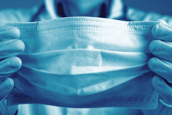 Typical surgical mask to cover mouth, nose. Protection concept, against coronavirus.