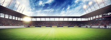 Futbol stadyumu, parlak ışıklar, saha manzarası. Futbol konsepti