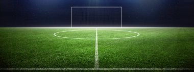 Futbol stadyumu, parlak ışıklar, saha manzarası. Futbol konsepti