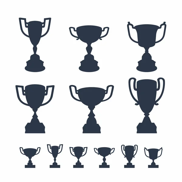 Trophy cups set. Black silhouettes of award cups with in different shapes on white background — Stock vektor