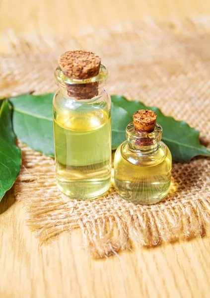 bay leaf oil in a small bottle.selecve focus nature