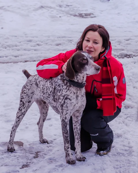 Dog and woman. Dnepropetrovsk. Ukraine. Royalty Free Stock Photos