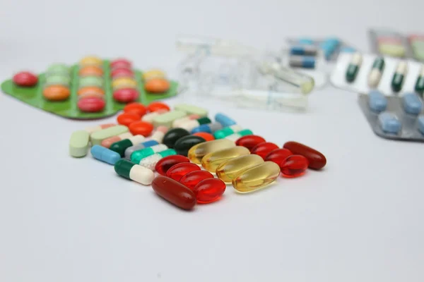 一大堆五颜六色的药物片剂-医学背景 — 图库照片