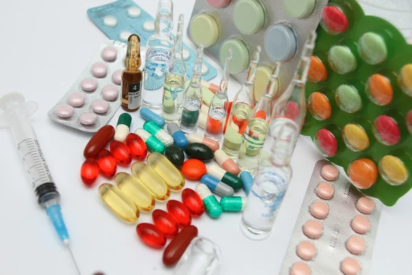 Colorful tablets and pills background — Stock Photo, Image