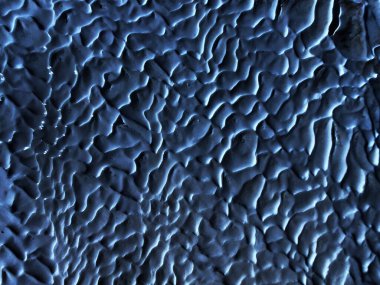 Mavi bir yüzeyden soyut arkaplan