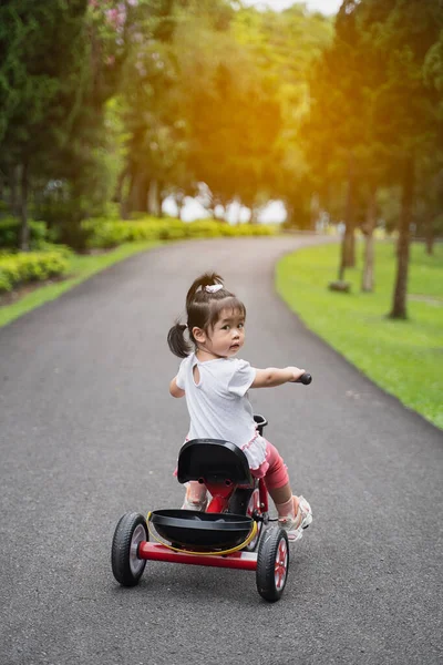 Cute Baby Riding Bicycle Garden — Stock Photo, Image