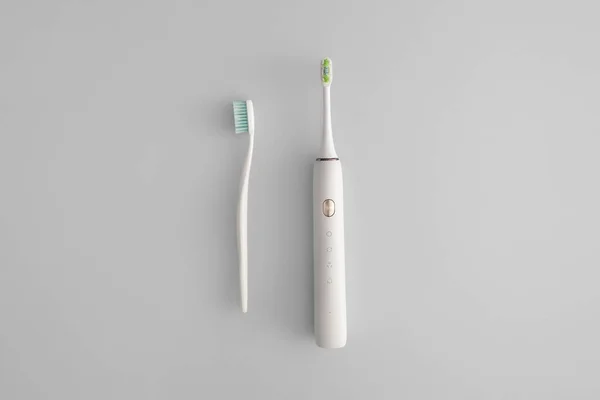 Manual Electric Toothbrushes Grey Background — Stock Photo, Image