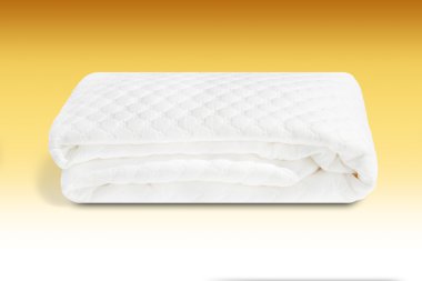 A padded mattress cover in cotton handmade in Italy clipart