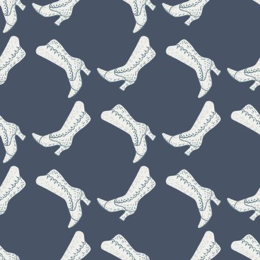 Cartoon seamless pattern with hand drawn white women boots ornament. Navy blue pastel backround. Vector illustration for seasonal textile prints, fabric, banners, backdrops and wallpapers.