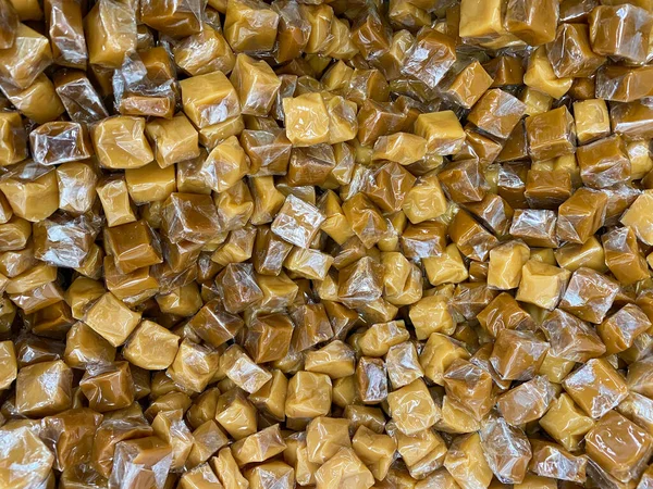 Overhead View Looking Bulk Pile Wrapped Caramel Candy Treats — Stock Photo, Image