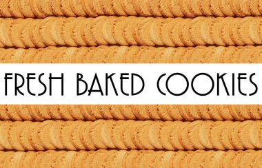 Büyük ekranda küçük kurabiye yığını mutfak tezgahında taze kurabiye ya da tepsi yemek sahnesi olarak sunuluyor