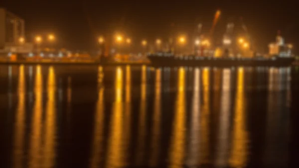Sea port at night - blurred photo — Stock Photo, Image