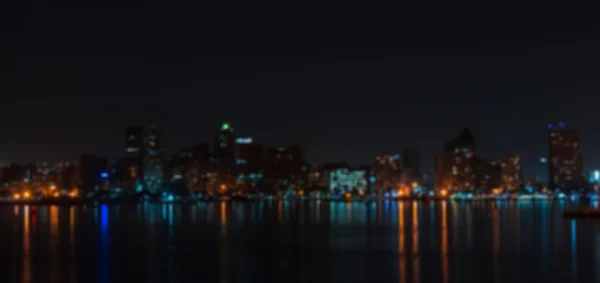 Городской пейзаж ночью - размытое фото Лицензионные Стоковые Изображения