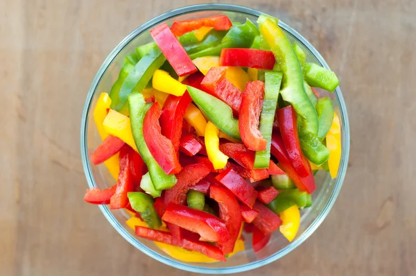 Colored peppers mixed in a bowl — Stock Photo, Image