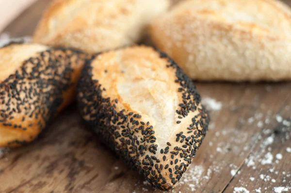 Bread with  sesame on a board — Stock Photo, Image