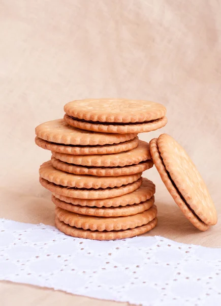 Biscoitos doces sobre fundo têxtil — Fotografia de Stock