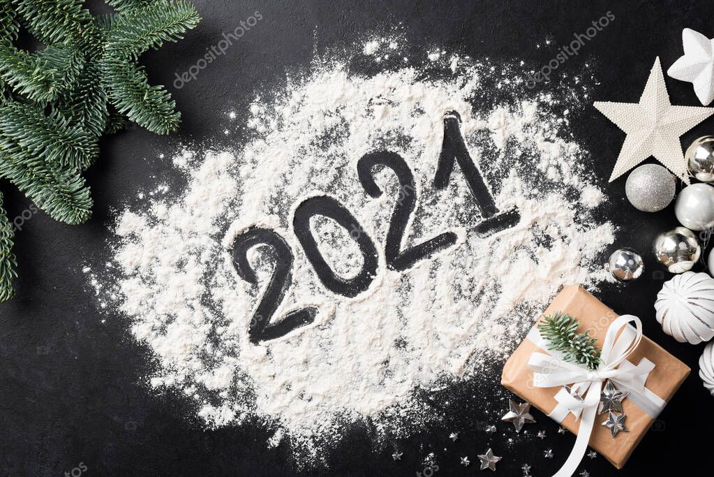 2021 new year symbol written with flour