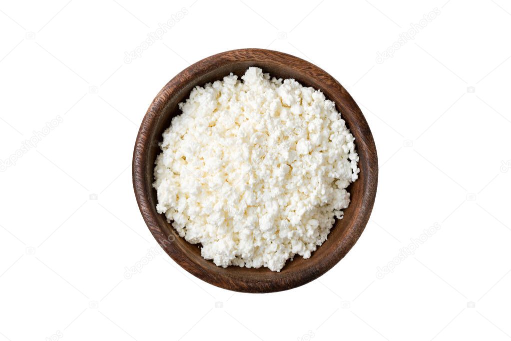 Cottage cheese, Farmer's cheese or tvorog in wooden bowl isolated on white