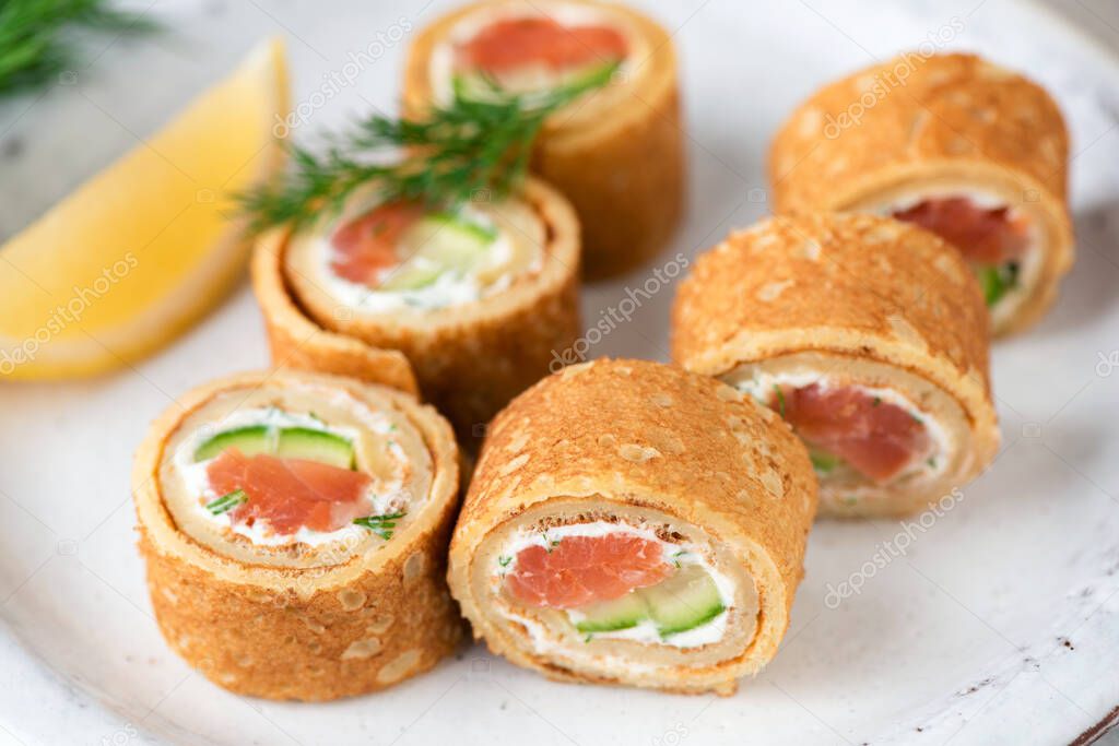 Salmon and cream cheese crepe rolls