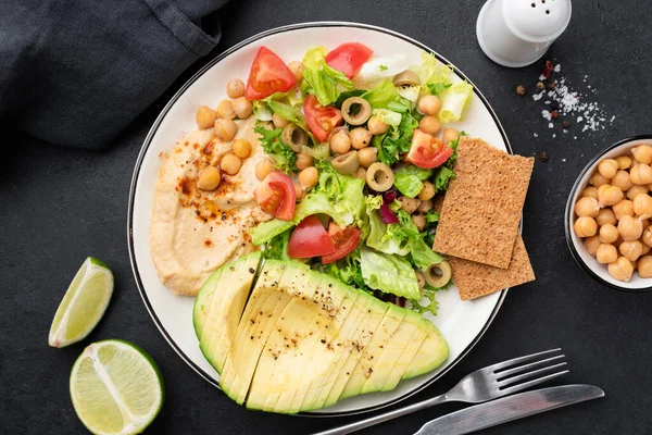 Healthy Salad Plate Avocado Hummus Vegetables Plate Top View Black — Stock Photo, Image