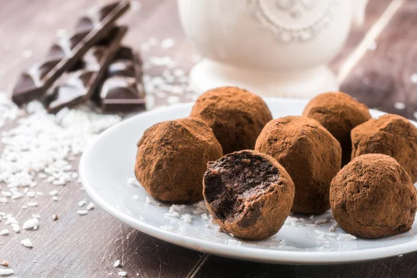 Chocolate truffles on plate — Stock Photo, Image