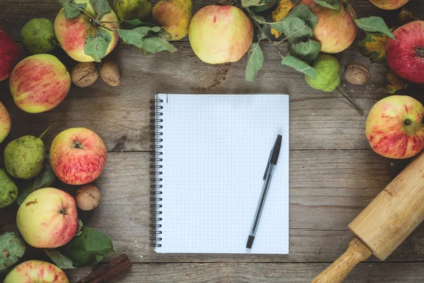 Autumn border from apples with blank copy book. Copy space — Stock Photo, Image