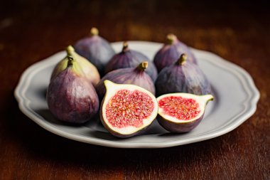 Group of figs on plate clipart
