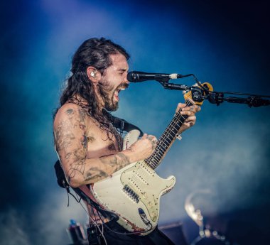 Biffy Clyro performing on stage during  music festival   clipart