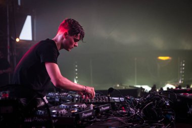 Martin Garrix performing on stage during  music concert  
