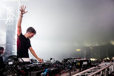 Martin Garrix performing on stage during  music concert  