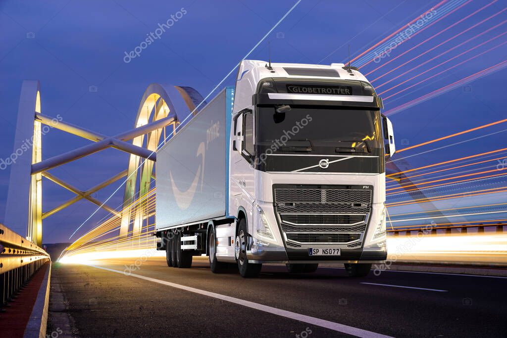 Volvo truck with Amazon Prime logo trailer on the road