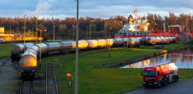 Railway cisterns, a truck with a tanker and a tanker at the fuel base of the Polish concern Orlen