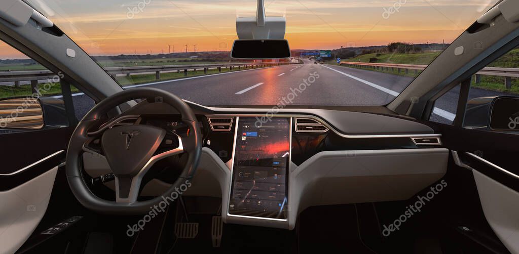 View from View from inside a Tesla X electric car on the highwayelectric car on the highway