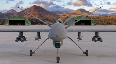 MQ-9 Biçici savaş uçağı üsteki pistte silahlı.