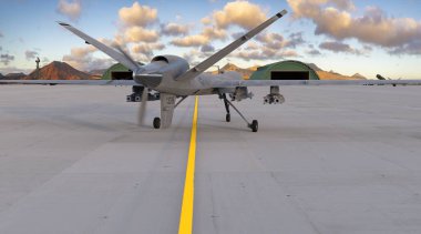 MQ-9 Biçici savaş uçağı üsteki pistte silahlı.