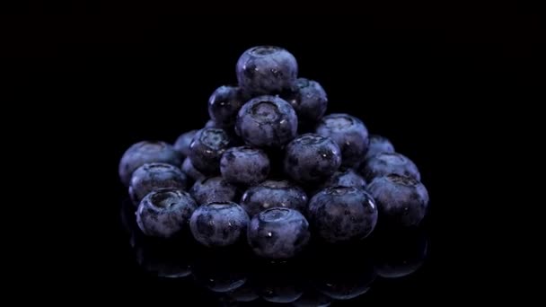 Blueberries Rotating Black Background Fresh Bio Blueberries Sprinkled Drops Water — Stock Video